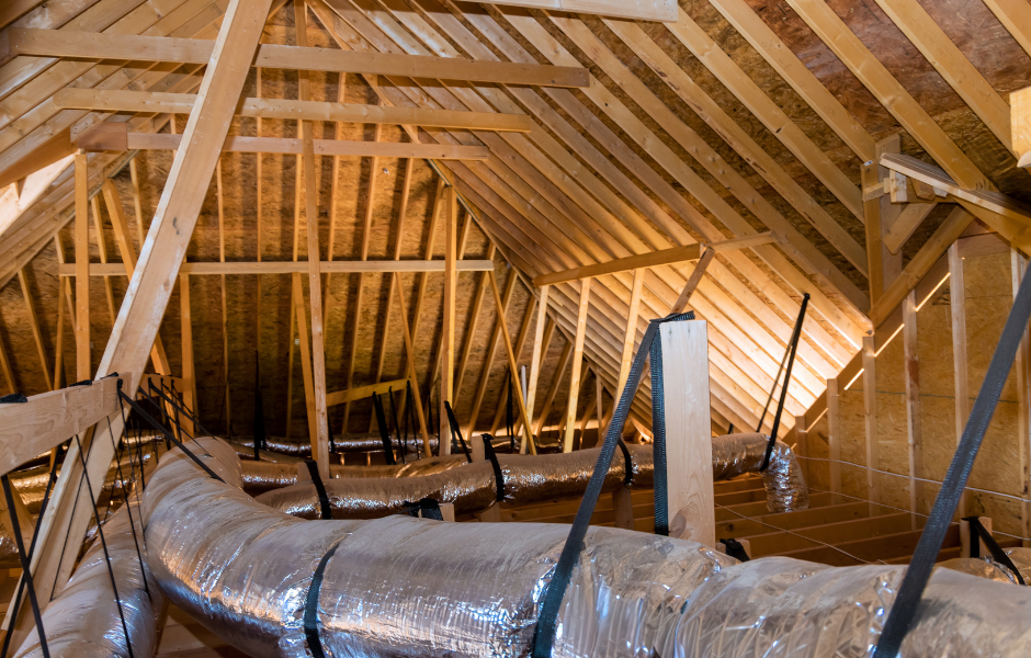 HVAC equipment and ductwork in a Florida attic showing the importance of attic insulation