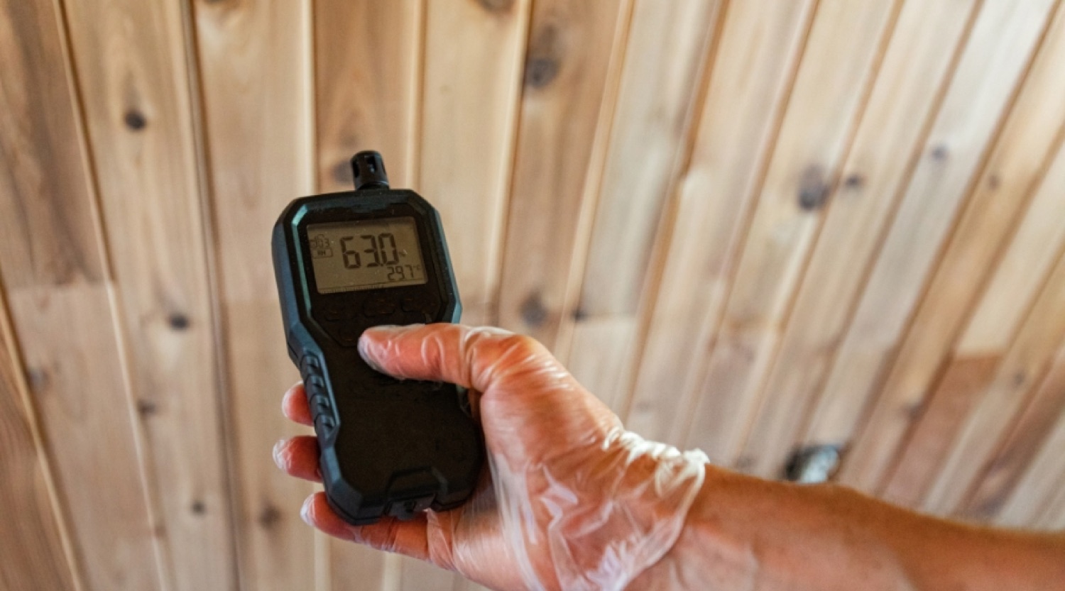 Florida homeowner consulting with HVAC technician about AC replacement options