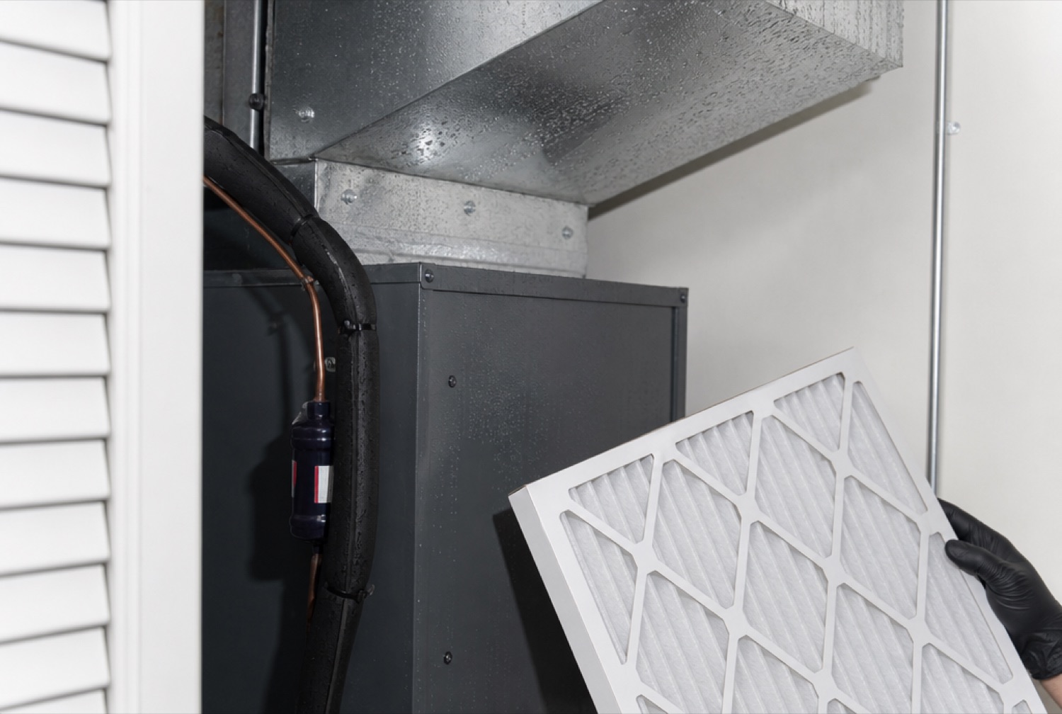 South Florida HVAC air handler with a clean replacement filter, showing humidity and moisture control