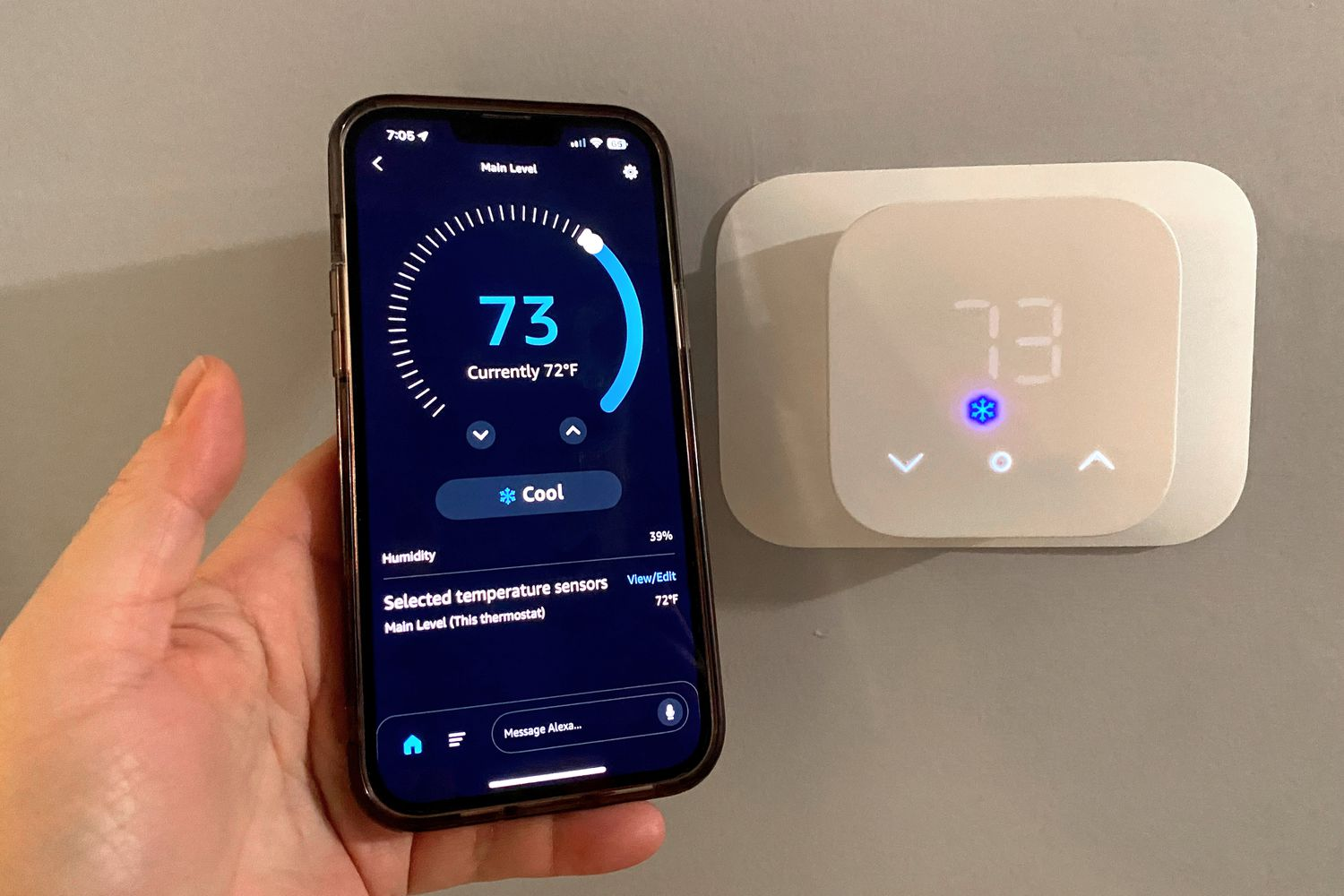 Smartphone app controlling smart thermostat remotely