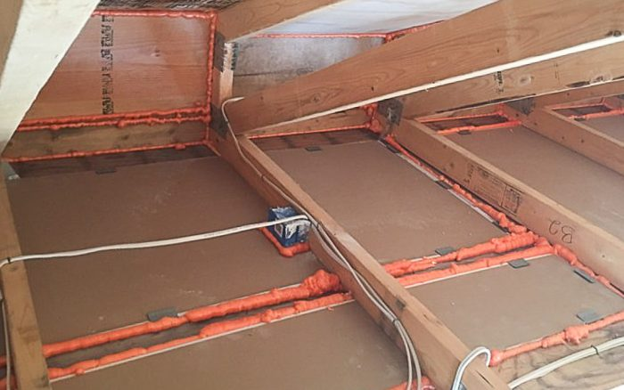 Clean attic floor prepared for air sealing and new insulation