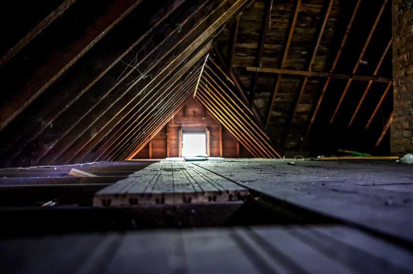 Energy efficient attic with new vacuum-installed insulation