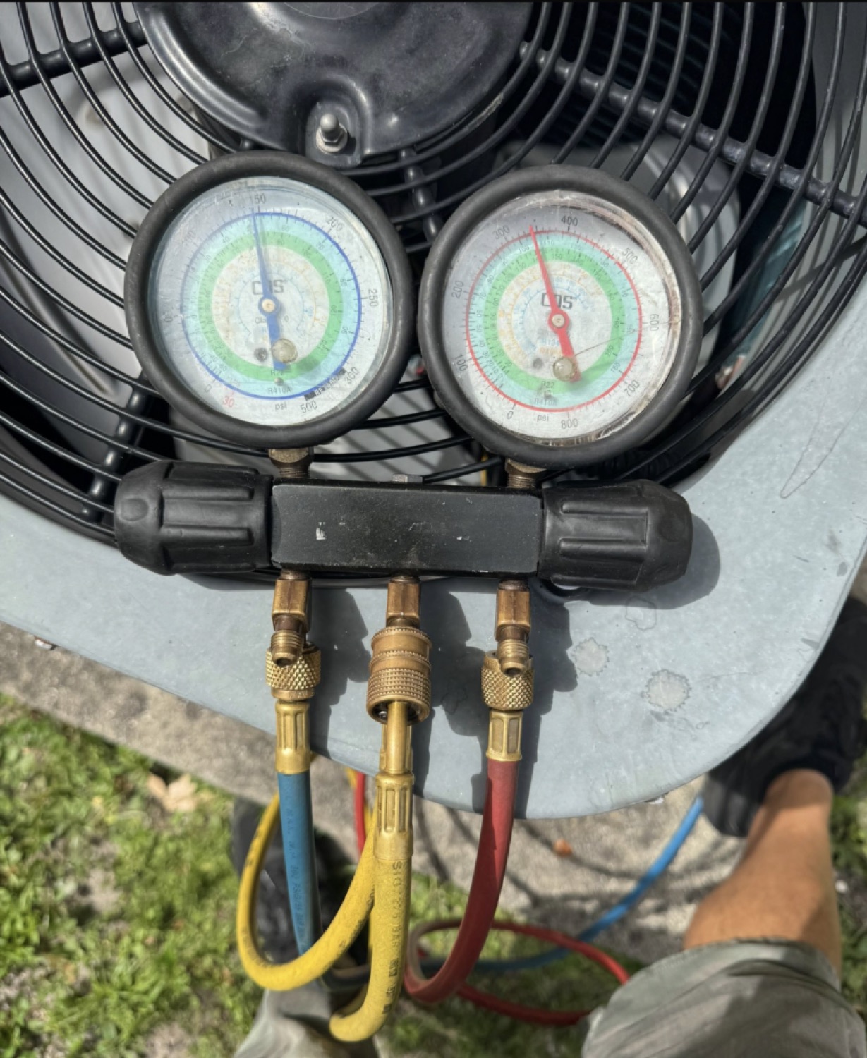 HVAC pressure gauges during AC diagnostic check